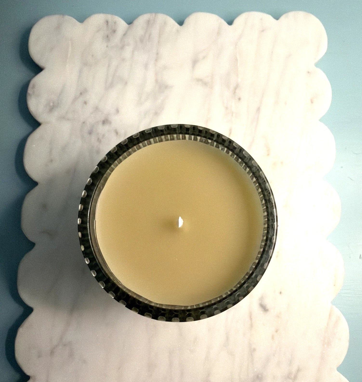 Elegant White Beeswax Candle in Green Glass Vessel